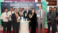 Meng Yuan, Qatar Country Manager, OPPO; Mohamed Anis, Division Manager, Prime Distribution Trading Company, a division of Ali Bin Ali Group, Authorised distributor for Oppo Mobile; with officials of Lulu Hypermarkets, Shiyas P P, Buying Manager; Krishna Kumar, D-Ring Branch Manager; and other senior officials during the ‘Unboxing Ceremony’ of Reno8 Series phones by Oppo at an event held at the D-Ring Road branch of Lulu. PIC: Salim Matramkot/The Peninsula