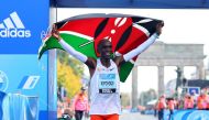 Kenya's Eliud Kipchoge celebrates as he wins the Berlin Marathon and breaks the World Record in Berlin on September 25, 2022.   REUTERS/Fabrizio Bensch