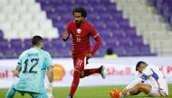 Akram Afif celebrates scoring Qatar's first goal against Chile during the International Friendly match at the Generali Arena, Vienna, Austria, on September 27, 2022.   REUTERS/Lisa Leutner
 