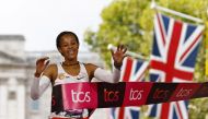 October 2, 2022 Ethiopia's Yalemzerf Yehualaw crosses the line to win the women's elite race Action Images via Reuters/Andrew Boyers