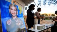 File Photo: An image of cinematographer Halyna Hutchins, who died after being shot by Alec Baldwin on the set of his movie 'Rust', is displayed at a vigil in her honour in Albuquerque, New Mexico, US, October 23, 2021. (REUTERS/Kevin Mohatt)