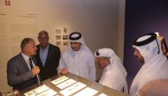 Minister of Culture H E Sheikh Abdulrahman bin Hamad Al Thani with other officials during the opening of the exhibition in Katara. 