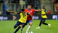 Ecuador's Byron Castillo in action against Chile's Jean Meneses  during their South American qualifiers for the 2022 FIFA World Cup at the Estadio San Carlos de Apoquindo, Santiago, Chile, on November 16, 2021.  File Photo / Reuters
