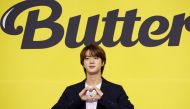 K-pop boy band BTS member Jin poses for photographs during a photo opportunity promoting their new single 'Butter' in Seoul, South Korea, May 21, 2021. REUTERS/Kim Hong-Ji/File Photo