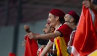 Supporters of Qatar and other Arab teams celebrate, in these file photos.