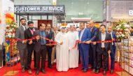 Senior officials during the inauguration of the outlet at Umm Garn.