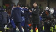 Chelsea's Ben Chilwell is helped off after sustaining an injury as Chelsea manager Graham Potter looks on during their Champions League  Group E match against Dinamo Zagreb at the Stamford Bridge, London, on November 2, 2022.   Action Images via Reuters/Peter Cziborra
 