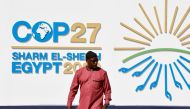 A man walks outside of the Sharm El Sheikh International Convention Centre during the COP27 climate summit opening in Egypt's Red Sea resort of Sharm el-Sheikh, Egypt, on November 6, 2022. REUTERS/Thaier Al-Sudani
 