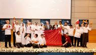 Secretary-General of the Supreme Committee for Delivery & Legacy H E Hassan Al Thawadi and FIFA President Gianni Infantino with other officials and members of the differently abled community during the event.