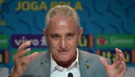 Brazil's coach Tite gestures as he announces the list of players for the upcoming Qatar 2022 World Cup football tournament, at the Brazilian Football Confederation (CBF) headquarters in Rio de Janeiro, Brazil, on November 7, 2022. (Photo by Carl DE SOUZA / AFP)