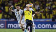 Ecuador's Byron Castillo in action with Argentina's Nicolas Gonzalez during their South American Qualifiers at the Estadio Monumental Banco Pichincha, Guayaquil, Ecuador, on March 29, 2022.  File Photo / Reuters
