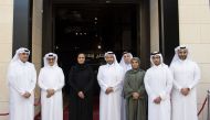 Chairperson of DFI H E Sheikha Al Mayassa bint Hamad bin Khalifa Al Thani (third left); Qatar Media Corporation CEO H E Sheikh Abdulaziz bin Thani Al Thani (fourth left); State Minister and QNL President H E Dr. Hamad bin Abdulaziz Al Kawari (second left); and other officials at the opening of Intaj exhibition.