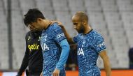 Tottenham Hotspur's Son Heung-min is helped off the pitch by Lucas Moura after sustaining an injury during their Champions League Group D match against Olympique de Marseille at the Orange Velodrome, Marseille, France, on November 1, 2022.  REUTERS/Eric Gaillard
