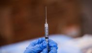 A syringe is filled with a dose of Covid-19 vaccine at a pop-up community vaccination center at the Gateway World Christian Center in Valley Stream, New York, US, February 23, 2021. (REUTERS/Brendan McDermid)