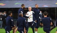 France’s Kylian Mbappe and his team-mates during training a training session. 