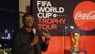 Marcel Desailly alongside the World Cup trophy during the Trophy Tour in Doha on Sunday. Reuters