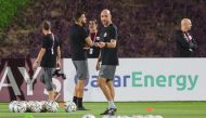 Qatar coach Felix Sanchez leads a training session in Doha, yesterday.