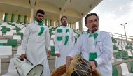 Saudi national football team fan and the head of the fan association for the prestigious Jeddah-based Saudi club Al-Ahly, Bader Turkistani, poses for a picture on November 9, 2022 in the Saudi Red Sea city of Jeddah. Photo by Amer Hilabi / AFP