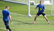 England's goalkeeper Aaron Ramsdale (L) and England's goalkeeper Jordan Pickford take part in a training session at Al Wakrah SC Stadium in Al Wakrah, south of Doha, on November 18, 2022, ahead of the Qatar 2022 World Cup football tournament. (Photo by Paul ELLIS / AFP)