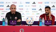 Qatar's Spanish coach Felix Sanchez (L) and Qatar's forward Hassan Al-Haydos attend a press conference at the Qatar National Convention Center (QNCC) in Doha. (Photo by Karim Jaafar / AFP)