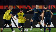 Portugal’s forward Cristiano Ronaldo (second right) takes part in a training session alongside teammates at Shahaniya Sports Club in Al Samriya, yesterday. AFP