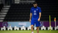 In this file photo taken on November 17, 2022, France's forward Karim Benzema looks down during a training session at the Jassim-bin-Hamad Stadium in Doha, ahead of the Qatar 2022 World Cup football tournament. Photo by FRANCK FIFE / AFP