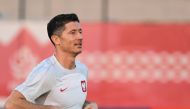 Poland's forward Robert Lewandowski takes part in a training session at the Al Kharaititat SC Training Site in Doha on November 21, 2022, on the eve of the Qatar 2022 World Cup football match between Mexico and Poland. (Photo by ANDREJ ISAKOVIC / AFP)