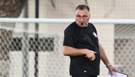 Poland's coach Czeslaw Michniewicz leads a training session at the Al Kharaititat SC Training Site in Doha on November 21, 2022, on the eve of the Qatar 2022 World Cup football match between Mexico and Poland. (Photo by ANDREJ ISAKOVIC / AFP)