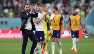 England's coach Gareth Southgate applauds supporters after the Qatar 2022 World Cup Group B football match between England and Iran at the Khalifa International Stadium in Doha on November 21, 2022. (Photo by Giuseppe CACACE / AFP)