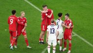 Wales' Gareth Bale, Aaron Ramsey and Brennan Johnson with Antonee Robinson and Tim Ream of the US after the FIFA World Cup Qatar 2022 Group B match between United States and Wales at Ahmad Bin Ali Stadium, Qatar, November 22, 2022. (REUTERS/Marko Djurica)