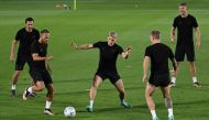 From left: Denmark’s midfielder Thomas Delaney, forward Martin Braithwaite, defender Jens Stryger Larsen, defender Daniel Wass and forward Andreas Cornelius take part in a training session at the Al Sailiya SC Training Site in Doha,  yesterday. AFP