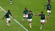 Saudi Arabia's Salem Al-Dawsari celebrates scoring their second goal with teammates REUTERS/Marko Djurica