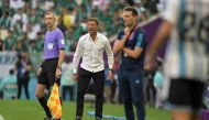 Saudi Arabia's French coach Herve Renard (C) reacts during the Qatar 2022 World Cup Group C football match between Argentina and Saudi Arabia at the Lusail Stadium in Lusail, north of Doha on November 22, 2022. (Photo by JUAN MABROMATA / AFP)