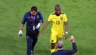 Ecuador coach Gustavo Alfaro with Enner Valencia after he was substituted during the World Cup match against Qatar at Al Bayt Stadium, Qatar, on November 20, 2022. (REUTERS/Molly Darlington)