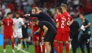 Denmark coach Kasper Hjulmand with Mikkel Damsgaard before he comes on as a substitute during the Qatar 2022 World Cup Group D football match between Denmark and Tunisia at the Education City Stadium in Al-Rayyan, west of Doha on November 22, 2022. (REUTERS/Kai Pfaffenbach)