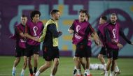 Belgium’s Jan Vertonghen, Axel Witsel, Arthur Theate and Yannick Carrasco with team-mates during a training session, yesterday. REUTERS