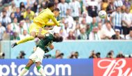 Saudi Arabia's goalkeeper Mohammed Al-Owais hits Saudi Arabia's defender Yasser Al-Shahrani in the head during the Qatar 2022 World Cup Group C football match between Argentina and Saudi Arabia at the Lusail Stadium in Lusail, north of Doha, on November 22, 2022. (AFP/Juan Mabromata)