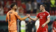 Wales' Gareth Bale shakes hands with Matt Turner of the US after their FIFA World Cup Qatar 2022 Group B match at the Ahmad Bin Ali Stadium, Al Rayyan, Qatar, on November 22, 2022.  REUTERS/John Sibley