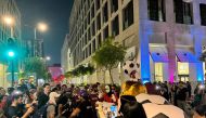 Football fans gather to celebrate FIFA World Cup Qatar 2022 at Msheireb Downton Doha. 