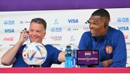 Netherlands' coach Louis Van Gaal (left) and Netherlands' defender Denzel Dumfries address a press conference at the Qatar National Convention Center (QNCC) in Doha on November 24, 2022, on the eve of the Qatar 2022 World Cup football match between Netherlands and Ecuador. (Photo by Alberto PIZZOLI / AFP)
 