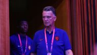 Netherlands coach Louis van Gaal and Denzel Dumfries arrive for a press conference at the Main Media Center, Doha, Qatar, on November 24, 2022.  REUTERS/Gareth Bumstead