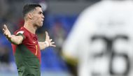 Portugal's forward Cristiano Ronaldo reacts during the Qatar 2022 World Cup Group H football match between Portugal and Ghana at Stadium 974 in Doha on November 24, 2022. (Photo by PATRICIA DE MELO MOREIRA / AFP)
 