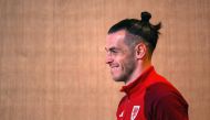 Wales' forward Gareth Bale arrives for a press conference at the Qatar National Convention Center (QNCC) in Doha on November 24, 2022, on the eve of the Qatar 2022 World Cup football match between Wales and Iran. (Photo by Nicolas TUCAT / AFP)