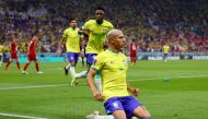 Brazil's Richarlison celebrates scoring their second goal during the FIFA World Cup Qatar 2022 Group G match against Serbia at Lusail Stadium, Lusail, Qatar, on November 24, 2022. REUTERS/Kai Pfaffenbach