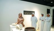  Prof Dr. Khalid bin Ibrahim Al Sulaiti, Director General of the Cultural Village Foundation, Katara, along with other officials during an exhibition. 