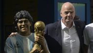 FIFA President Gianni Infantino poses during a tribute ceremony to late football star Diego Maradona on the 2nd anniversary of his death at CONMEBOL fan zone 'Tree of dreams' during the Qatar 2022 World Cup football tournament in Doha on November 25, 2022. (Photo by JUAN MABROMATA / AFP)