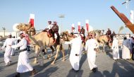 A participating team rides camels during the launch of Qatar National Day activities at Darb Al Saai yesterday. PIC: Mohamed Elshaer