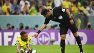 Brazil’s Neymar with referee Alireza Faghani during the Qatar 2022 Group G match on Thursday. 