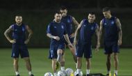 Argentina’s forward Lionel Messi (second left) takes part in a training session with team-mates at the Qatar University training site yesterday. AFP