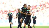 Australia's Mitchell Duke celebrates scoring the only goal of the FIFA World Cup Qatar 2022 Group D match against Tunisia with Jackson Irvine at the Al Janoub Stadium, Al Wakrah, Qatar, on November 26, 2022.  REUTERS/Hannah Mckay